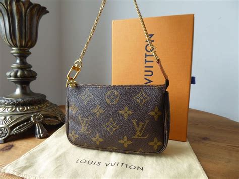 louis vuitton pochette braun|louis vuitton monogram accessories.